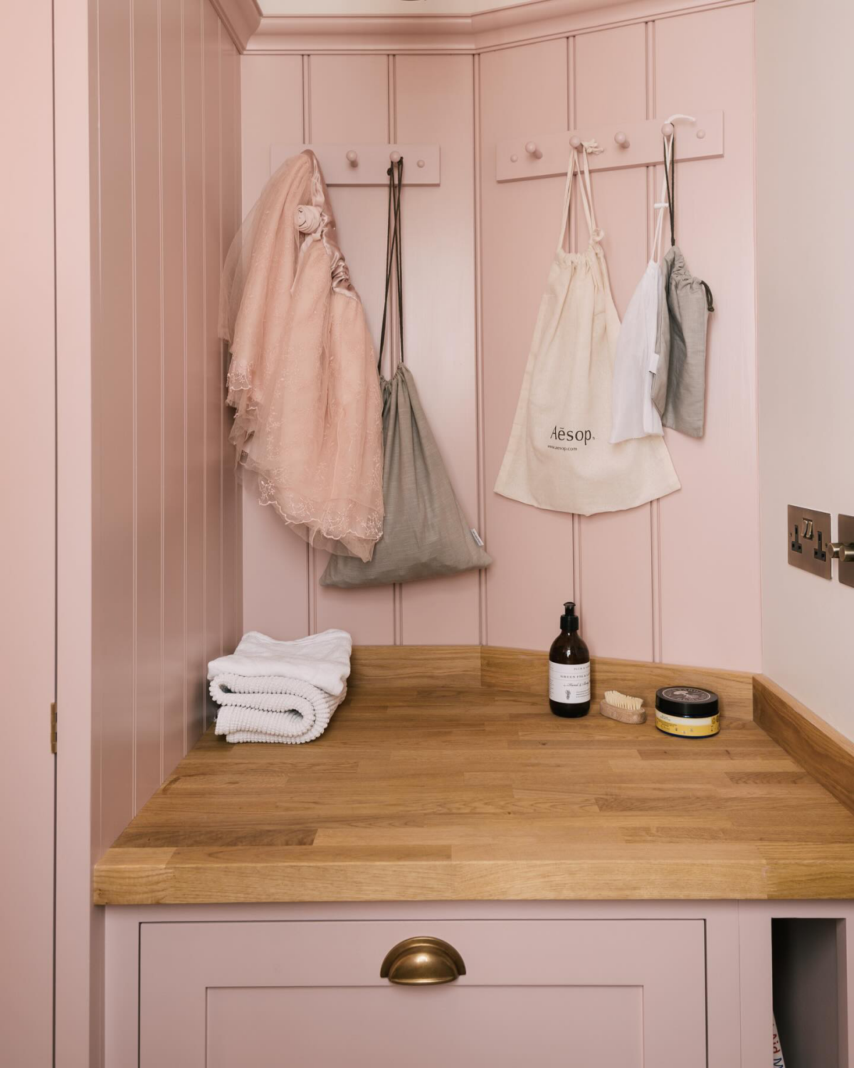 pink laundry room nook