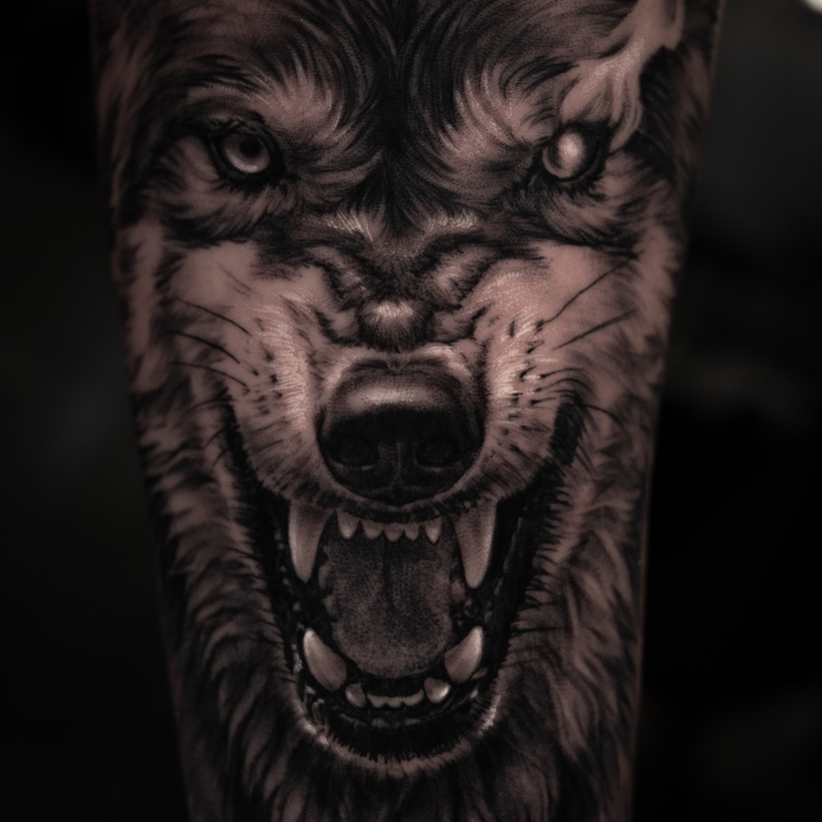 realistic tattoo of a wolf