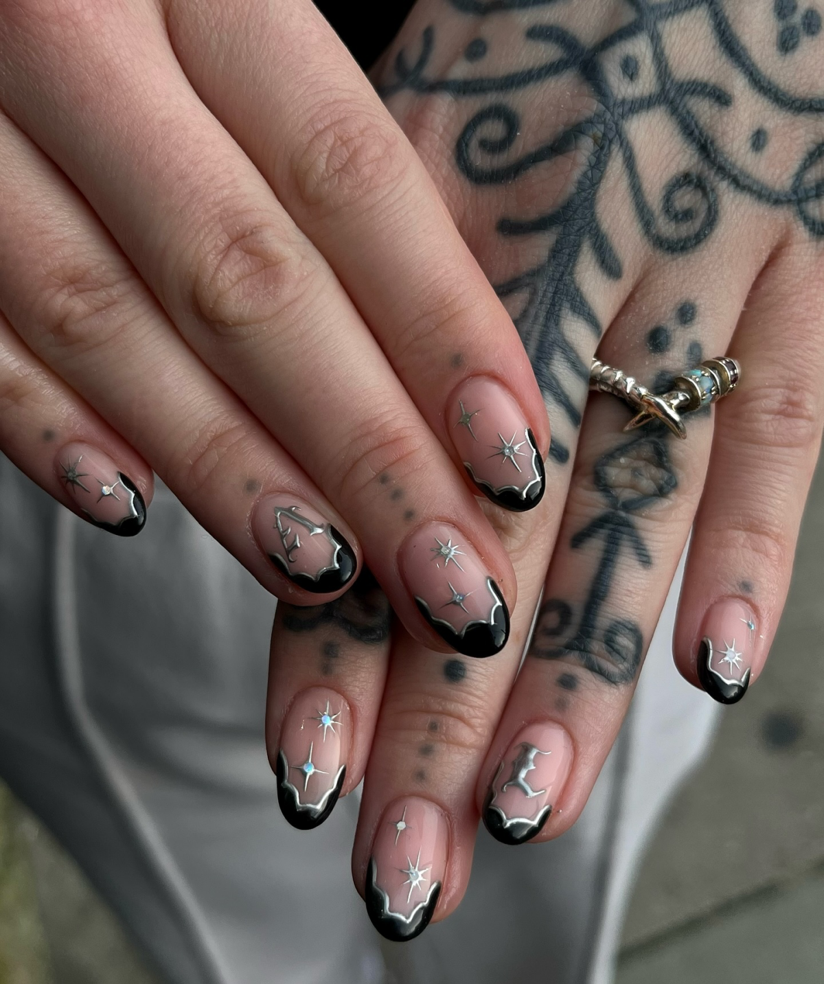 scalloped french nails with chrome silver and black