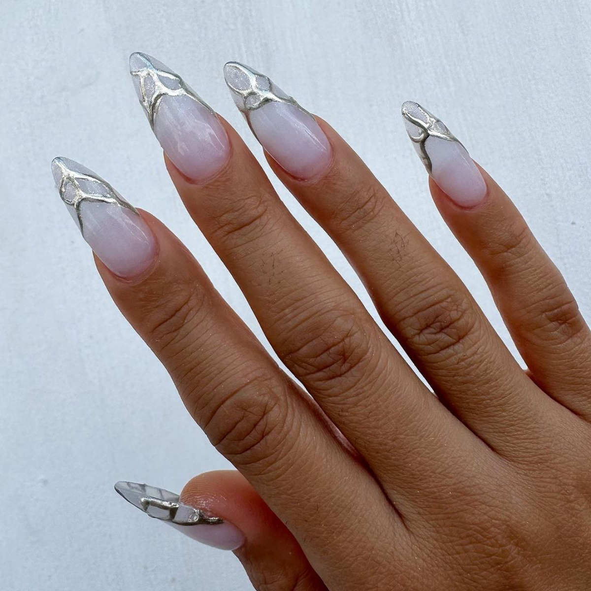 silver chrome accent on white nails
