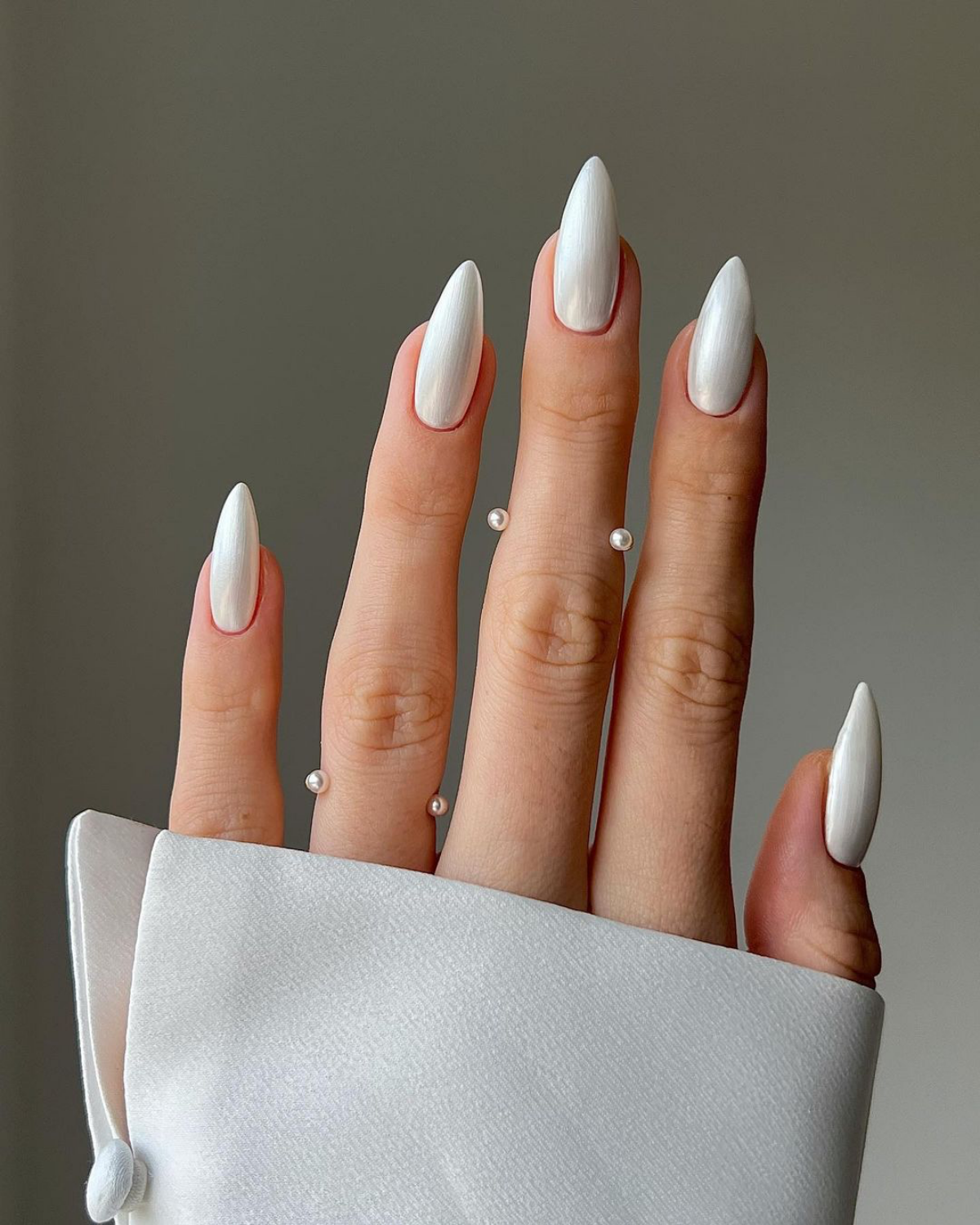 white chrome nails on hand