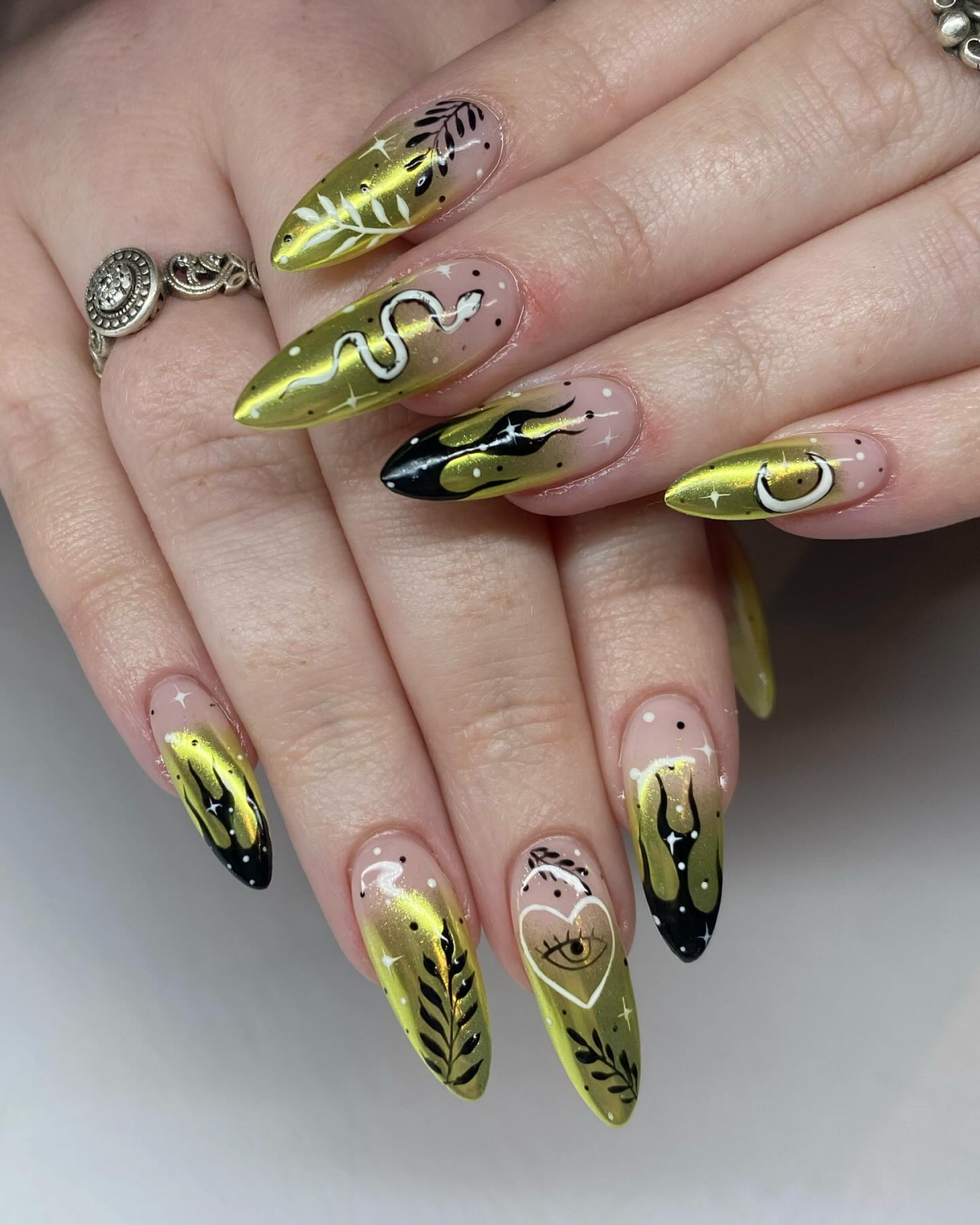 witch aestehtic nails with green chrome