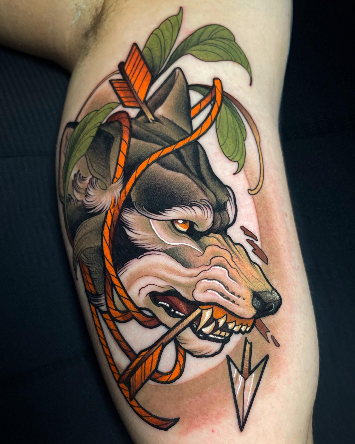 wolf tattoo colorful wolf breaking an arrow