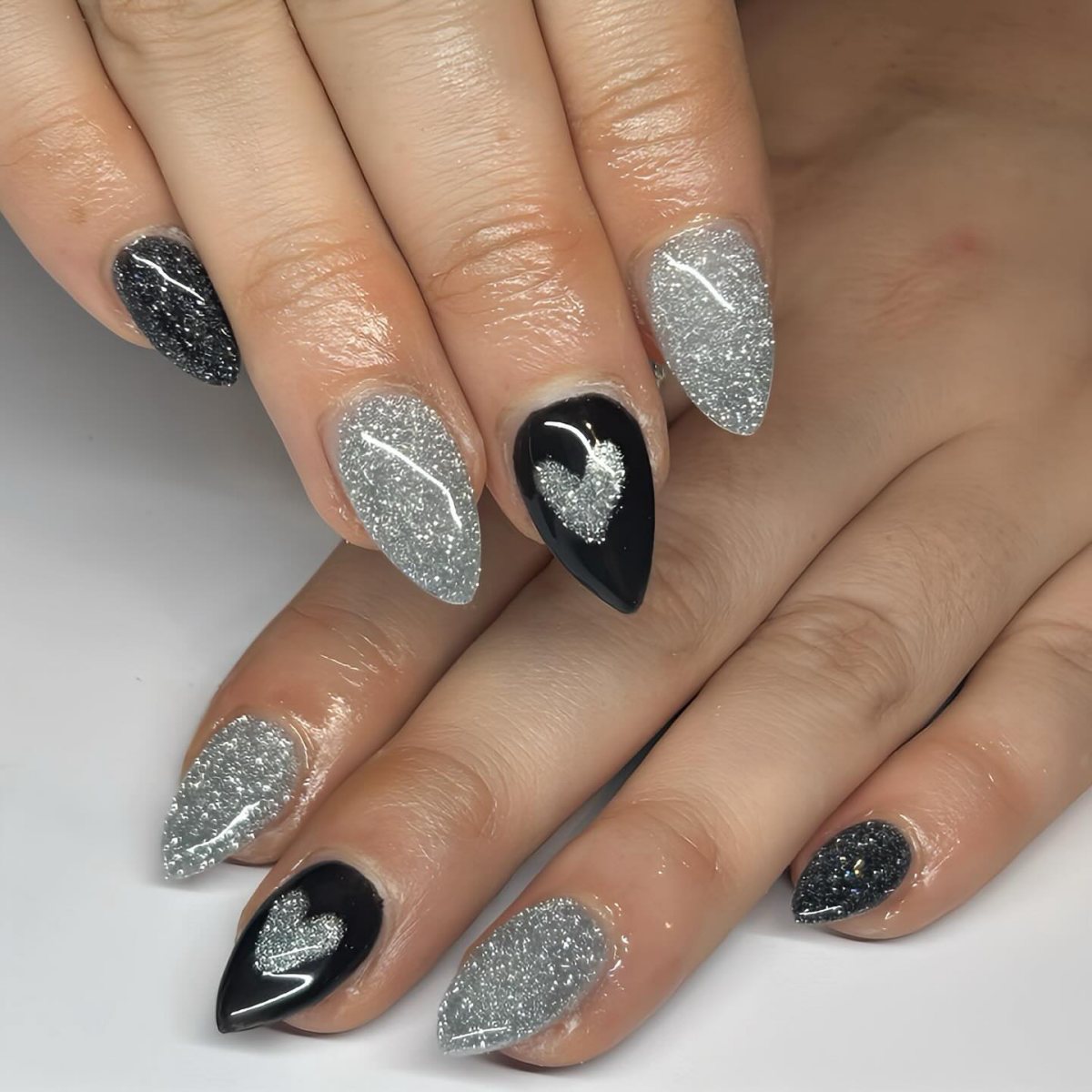 black and silver glitter nail