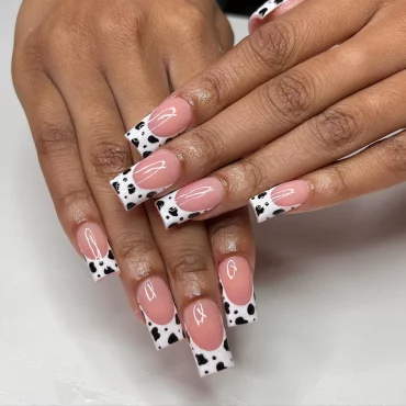 black and white cow print french manicure