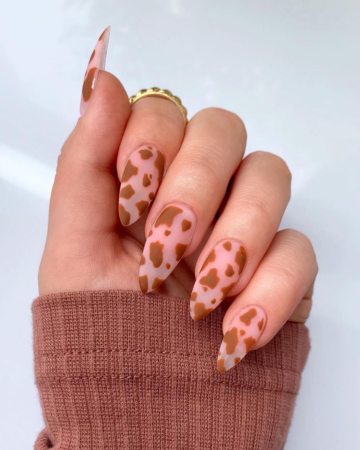 brown cow print design for nails