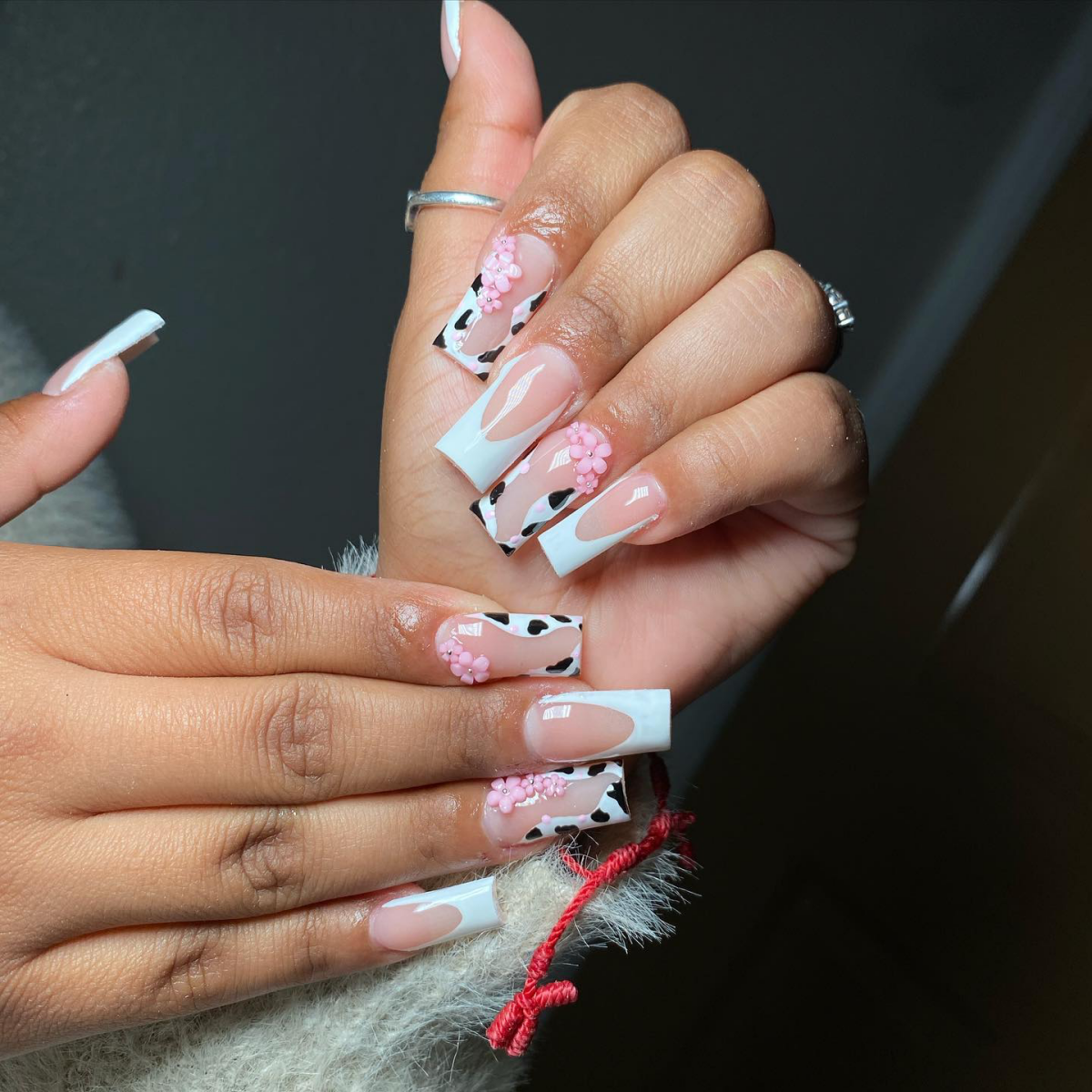 cow prink french manicure with pink flowers