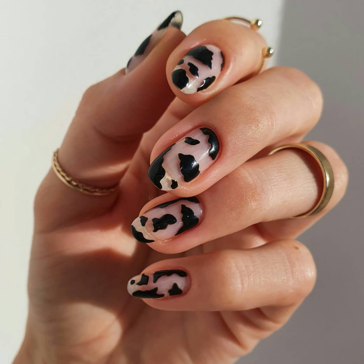 cow print nails black and neutral