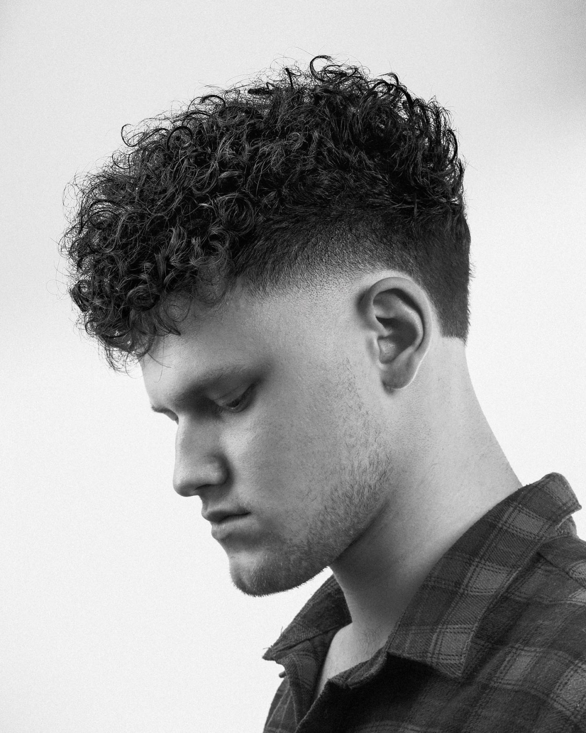curly taper hairstyle for men