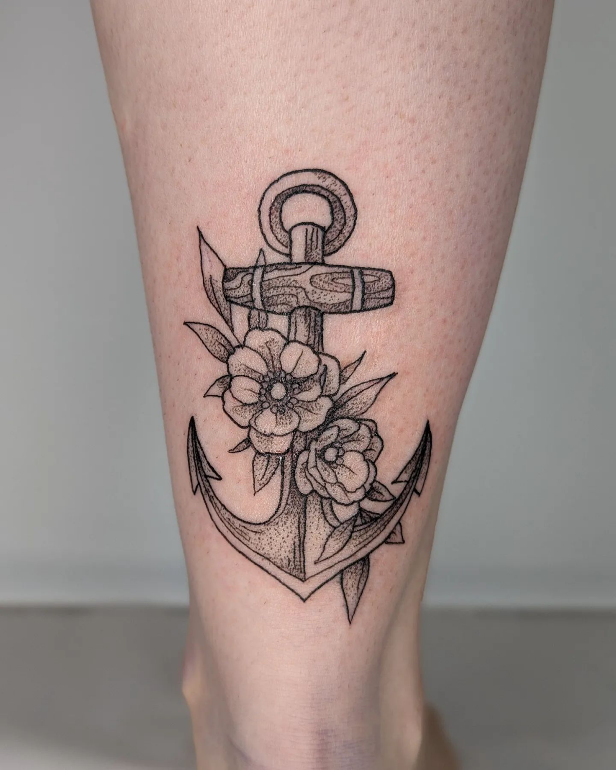 floral anchor tattoo