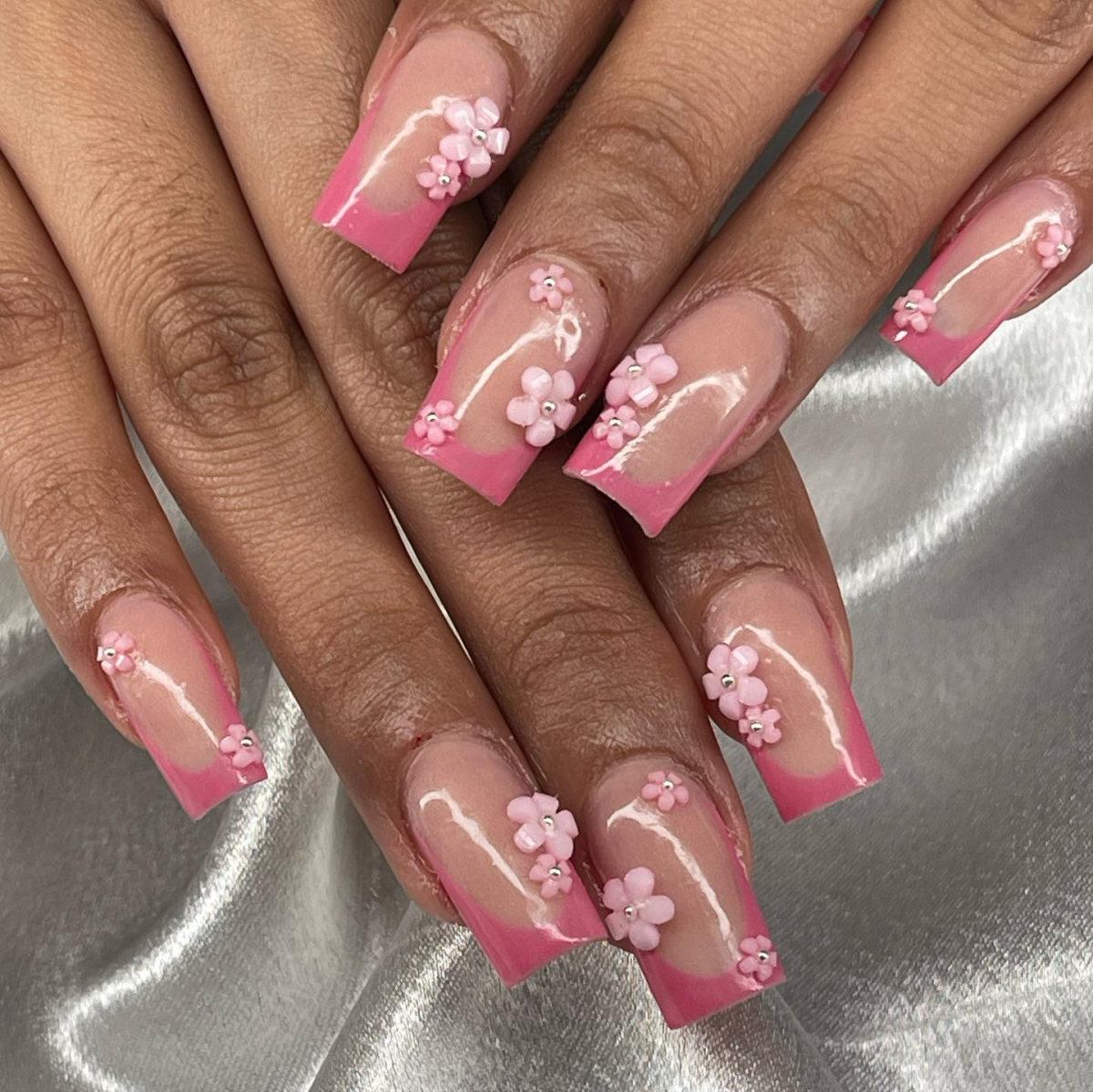 flowers on pink nails