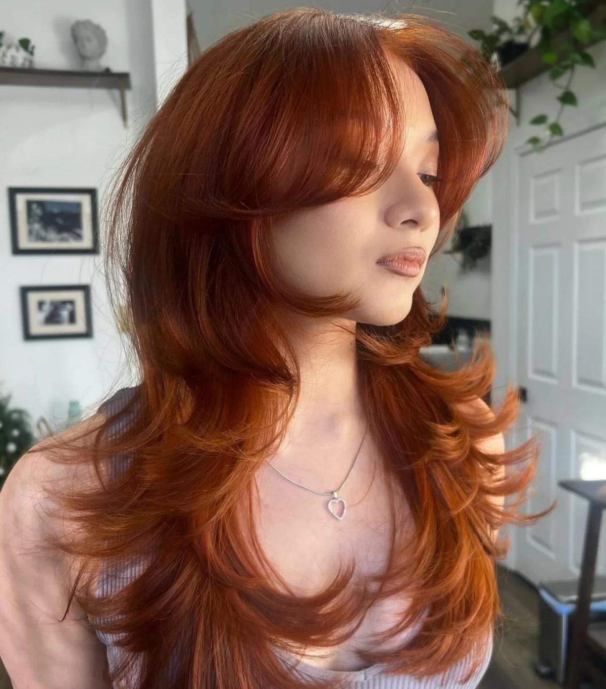 ginger hair with layers and butterfly bangs