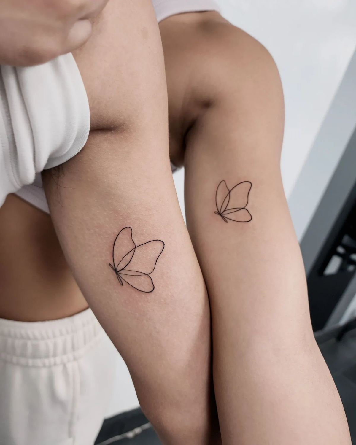 matching butterfly tattoo