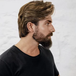 medium length hairstyles men man with quiff and beard