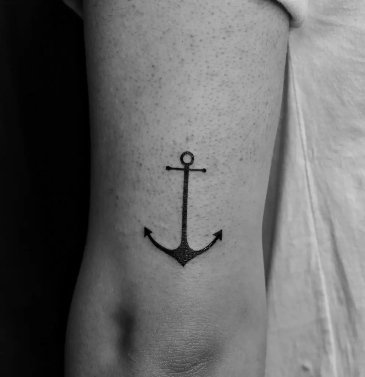 minimalistic anchor tattoo