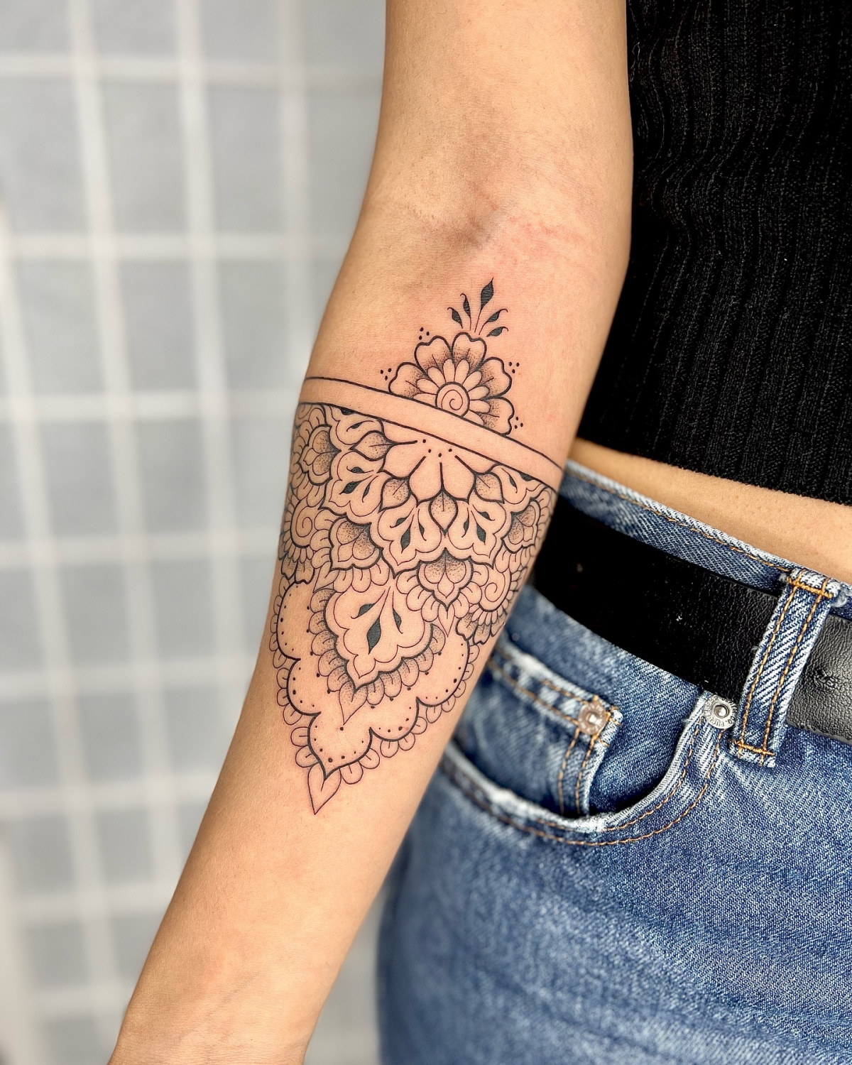 ornamental arm cuff tattoo