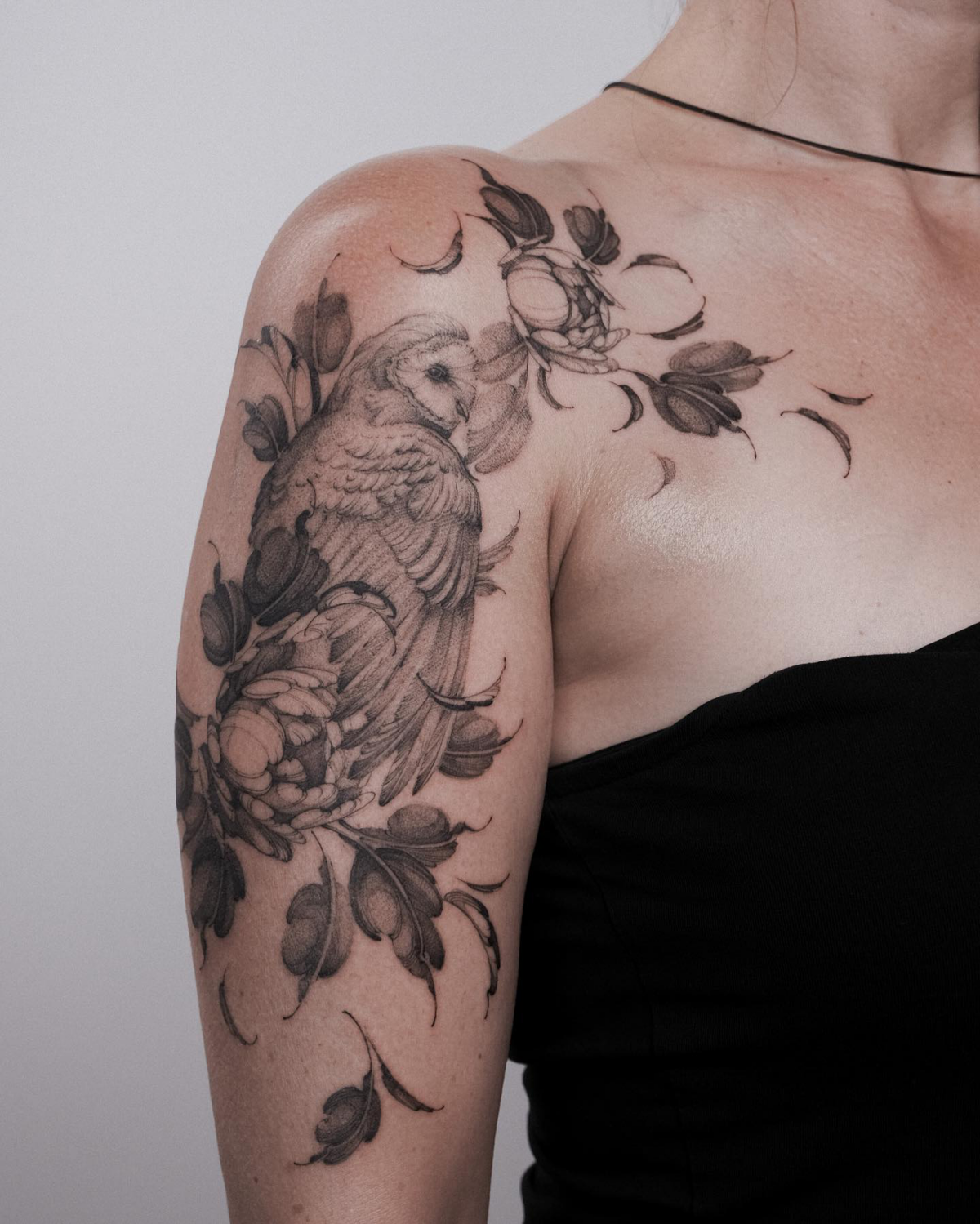 owl with peonies shoulder tattoo