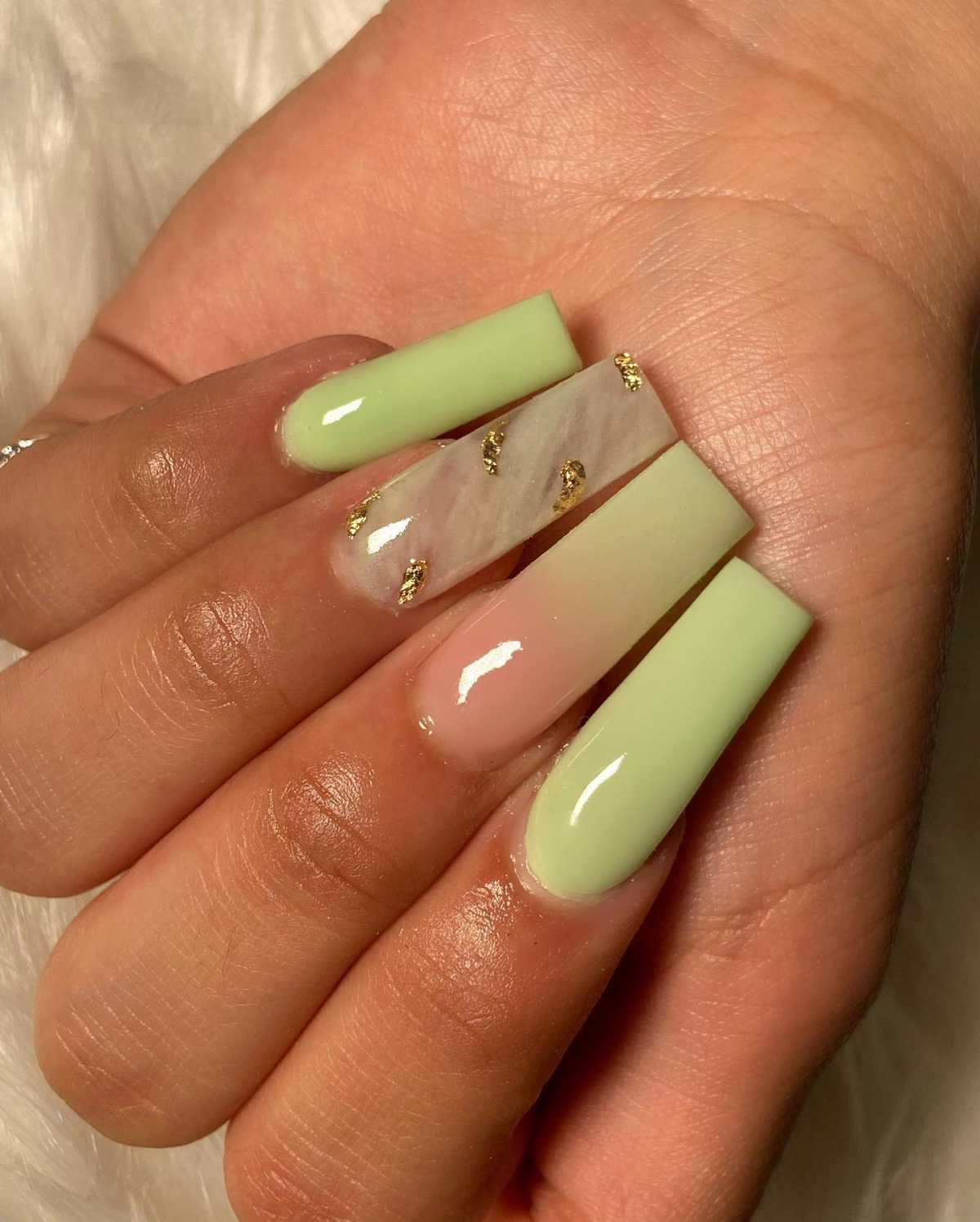 pastel lime green nails with gold