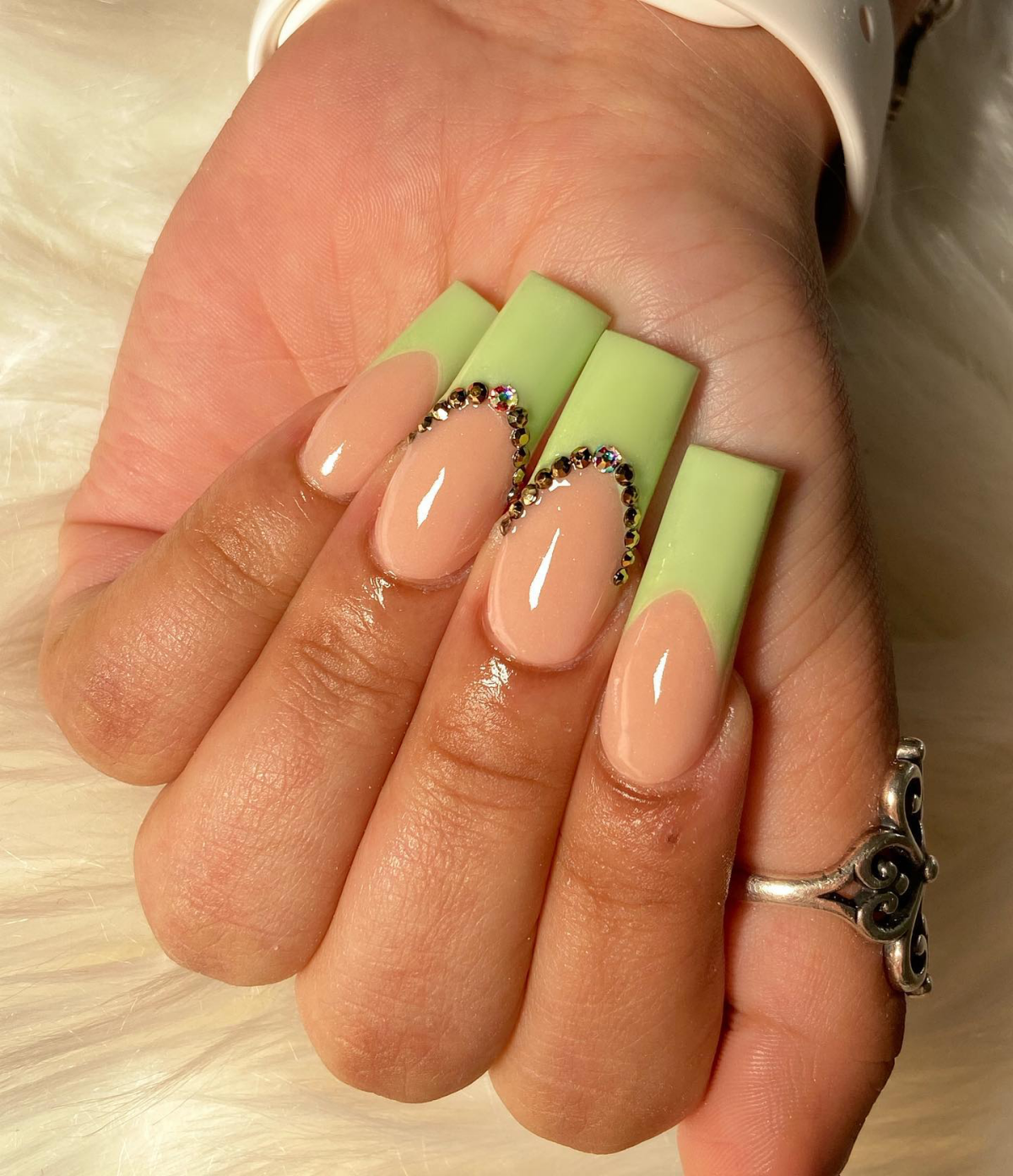 rhinestones on lime green french tip