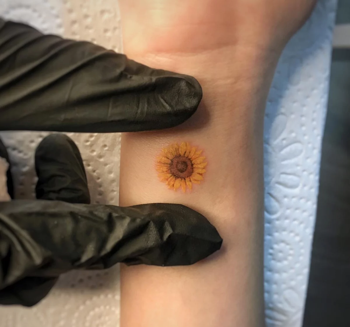 tiny sunflower tattoo
