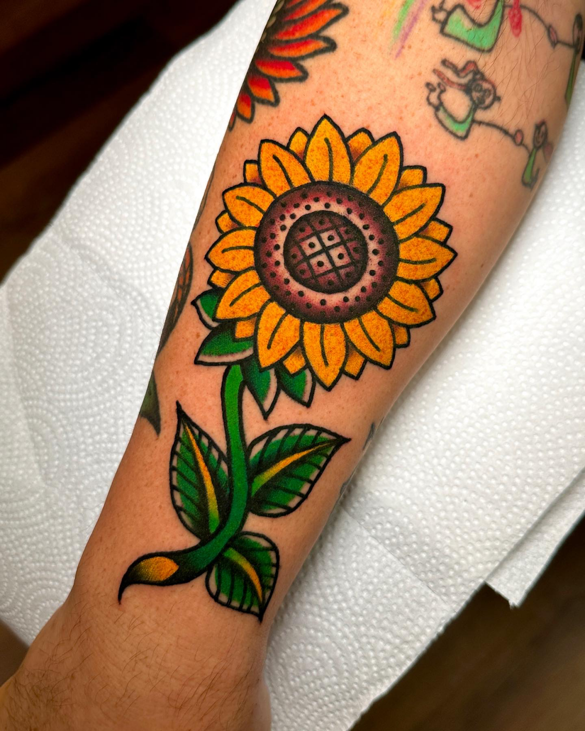traditional style sunflower tattoo