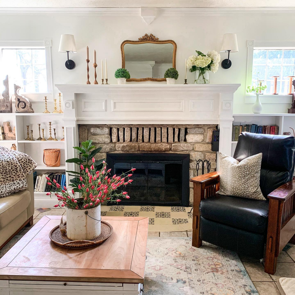 white mantel and rock fireplace