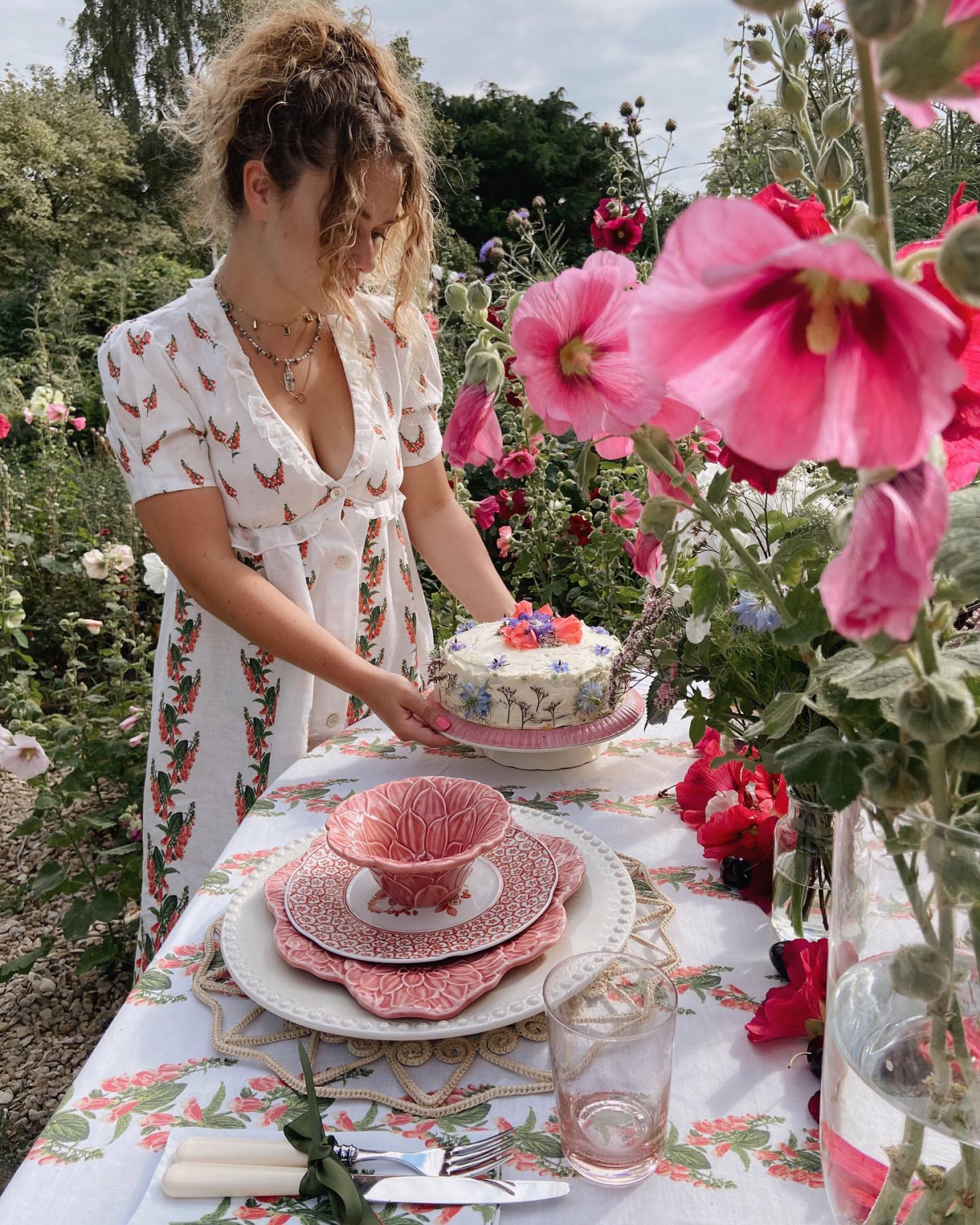 woman setting table for tea party