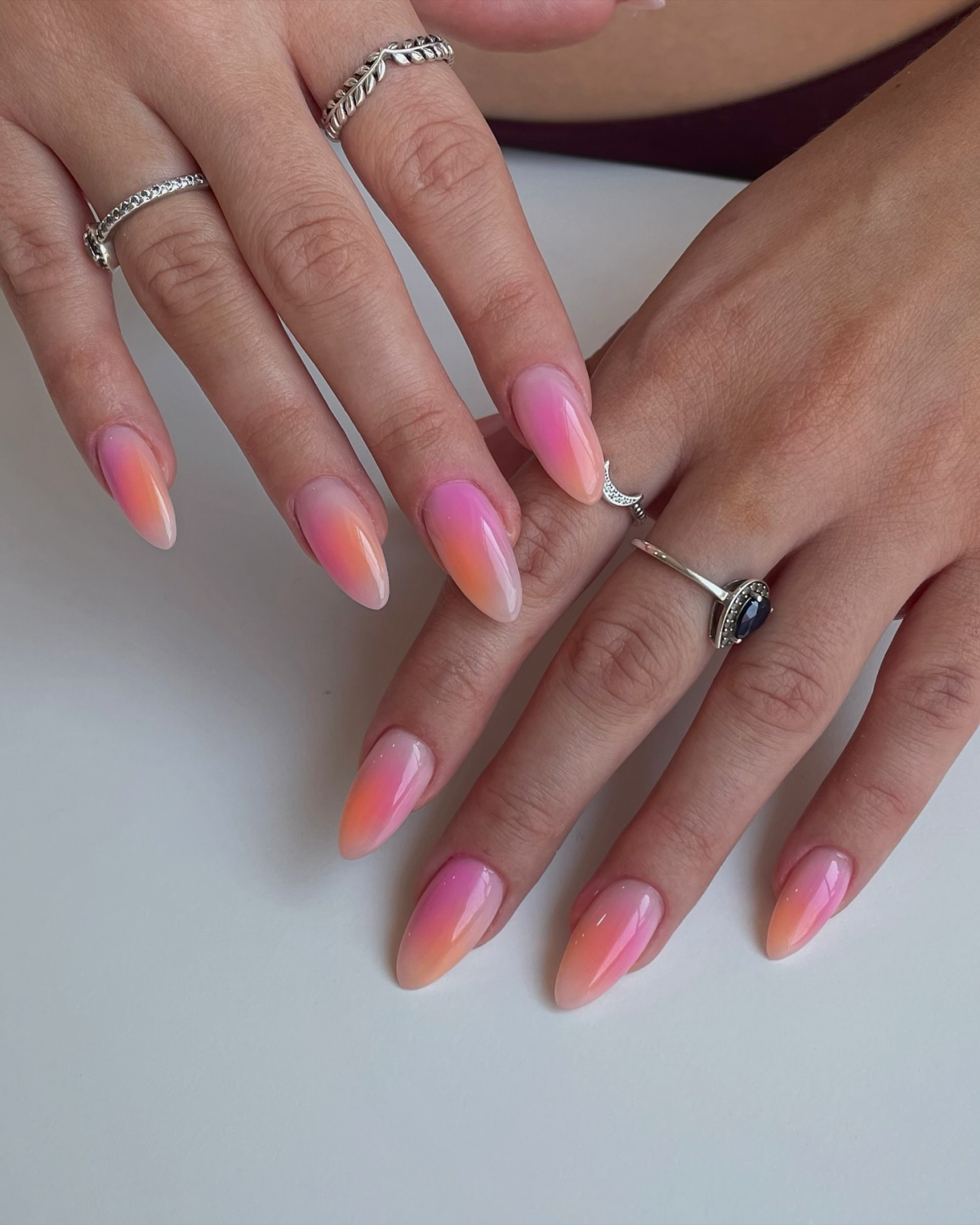 aura nails in pink and orange