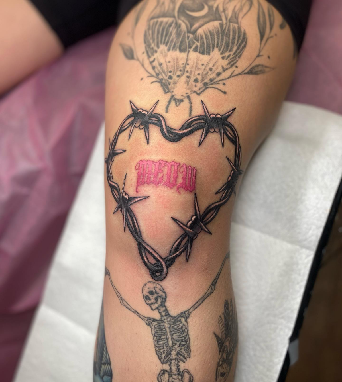 barbed wire heart on knee