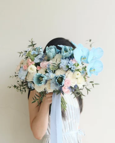 blue bridal boquet with orchids