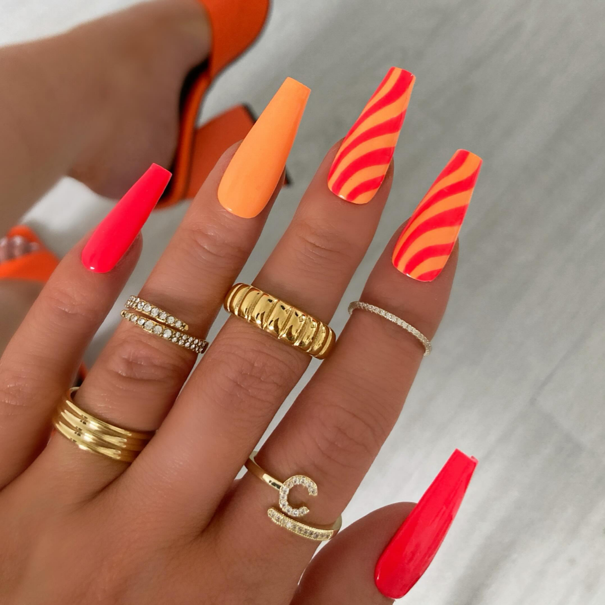 bright orange and red nails