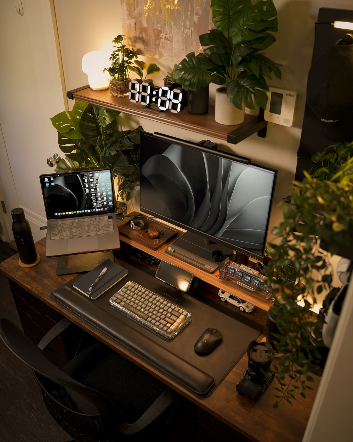 desk surrounded by plants