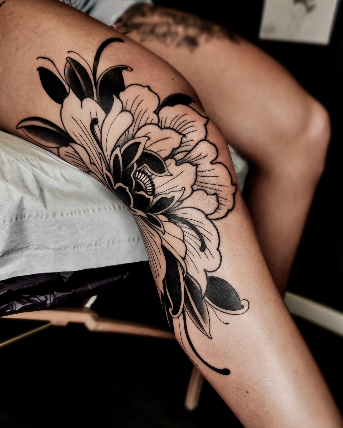 floral tattoo on knee
