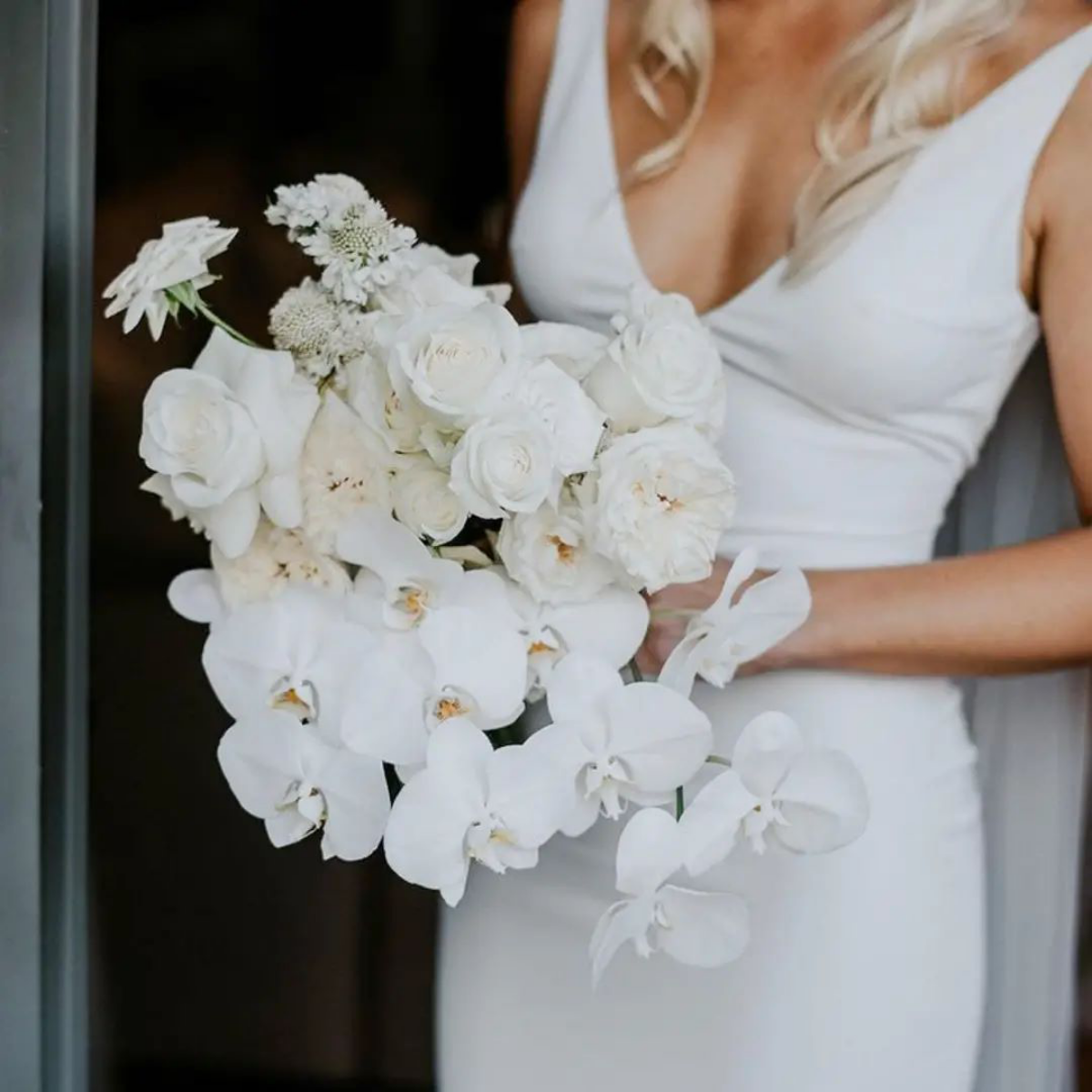 orchid wedding bouquet white orchids with bride 