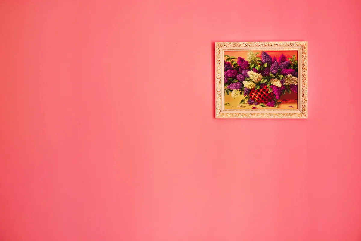 beautiful painting of flowers on pink wall