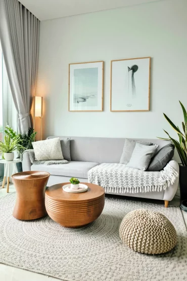 sofa in gray anthracite and posters on the wall